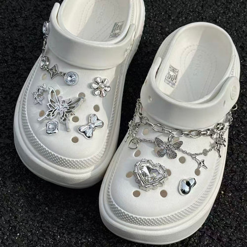 Crocs shoe charms: electronic silver butterfly