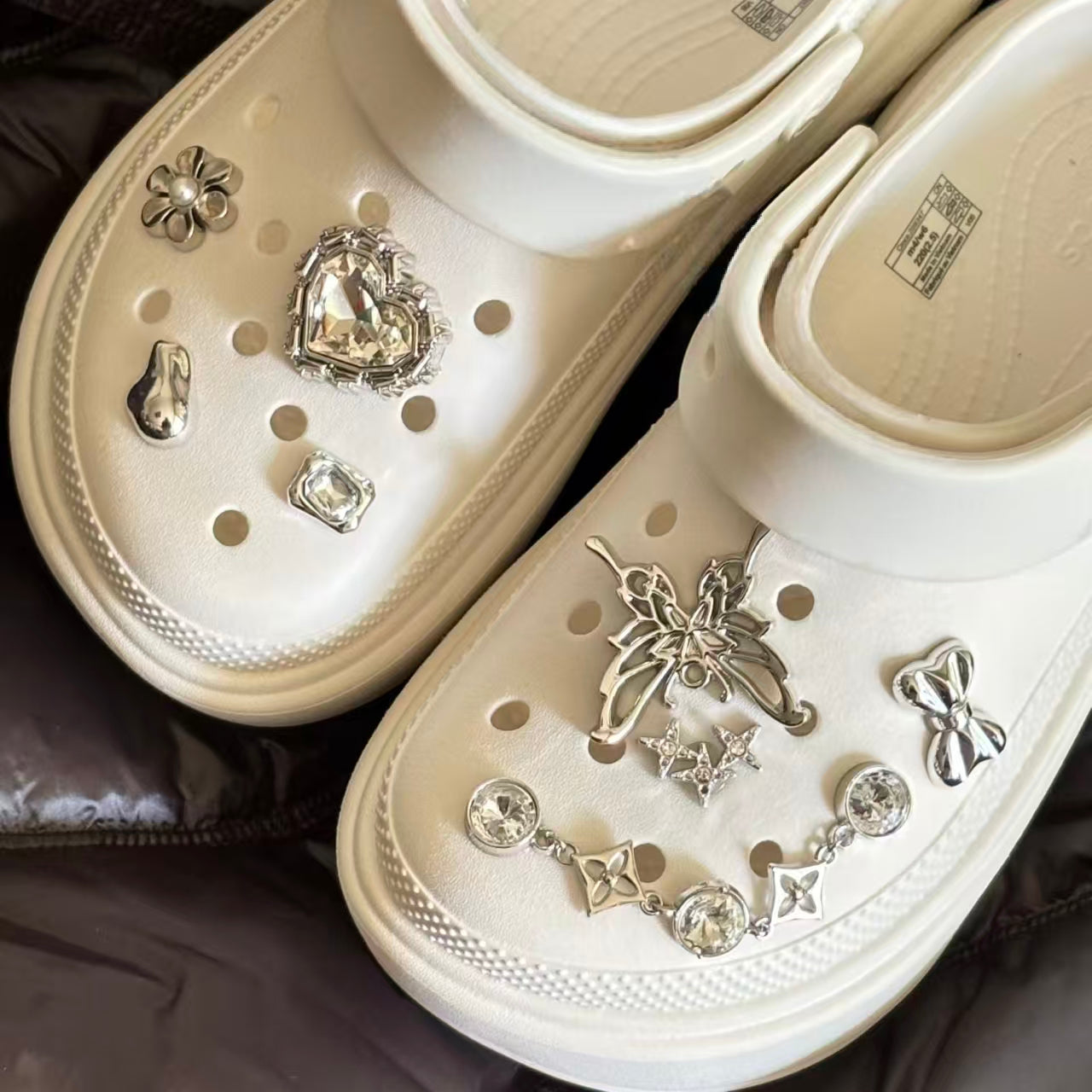 Crocs shoe charms: electronic silver butterfly